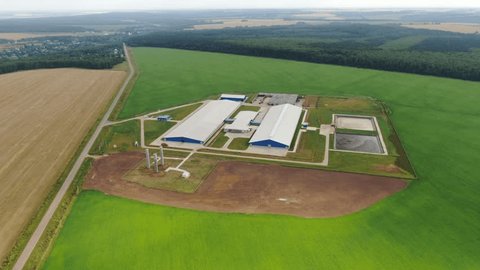 Aerial Forward Flight over Agricultural Buildings Roads