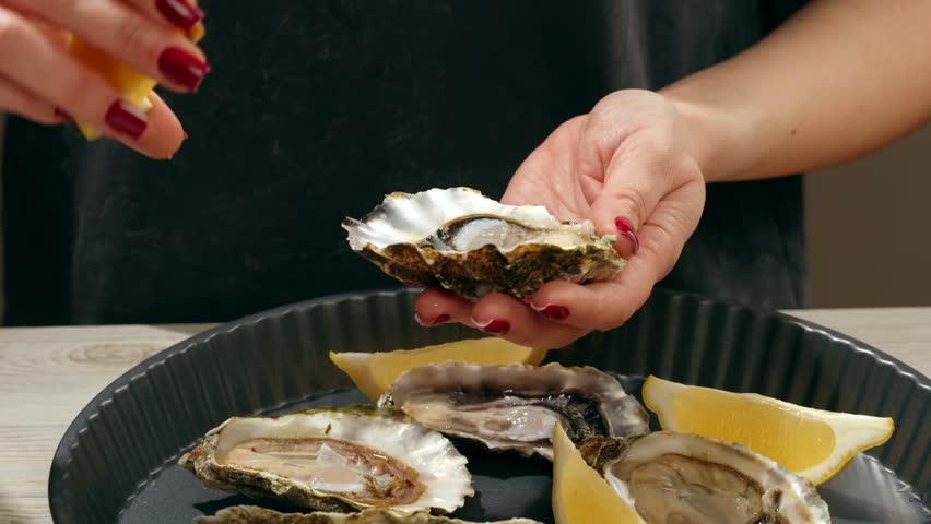 Fresh raw oysters with ice, french restaurant, mediterranean Healthy sea food, gourment luxury cuisine. Close up of seafood restaurant. 