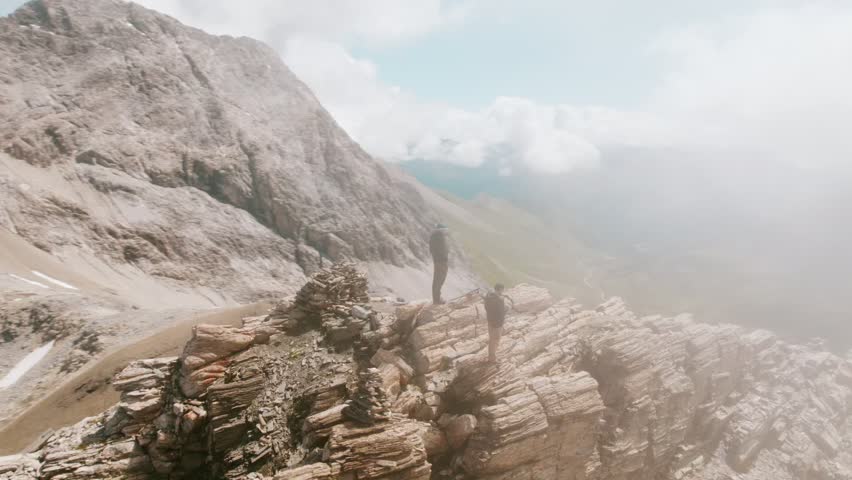 Rocky Mountain Hiking Trail Winding Through Alpine Landscape