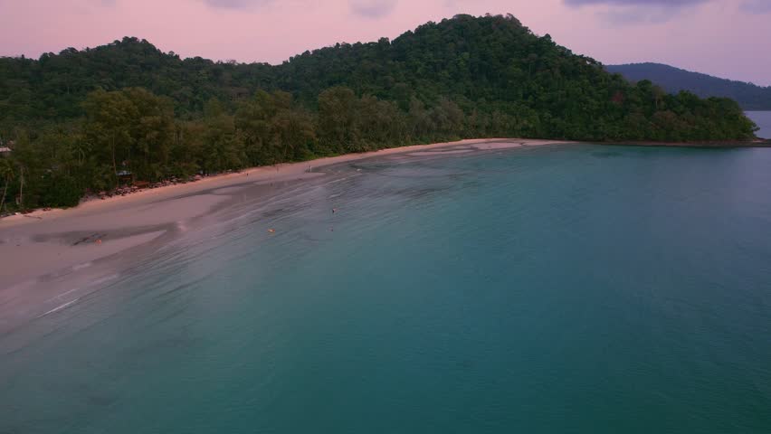 Tranquil Beach Of Khlong Hin At Dusk On Koh Kood Island, Thailand. wide aerial shot