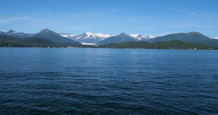 Amazing landscape of Alaska, Juneau.Mendenhall Glacier and the snow capped surrounding mountains.
