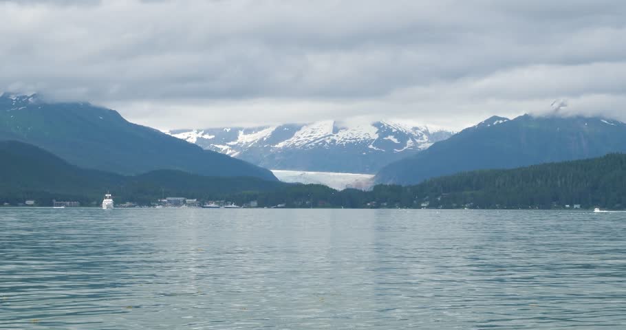 Mendenhall Glacier and the surrounding mountains covered by clouds, Juneau, Alaska.