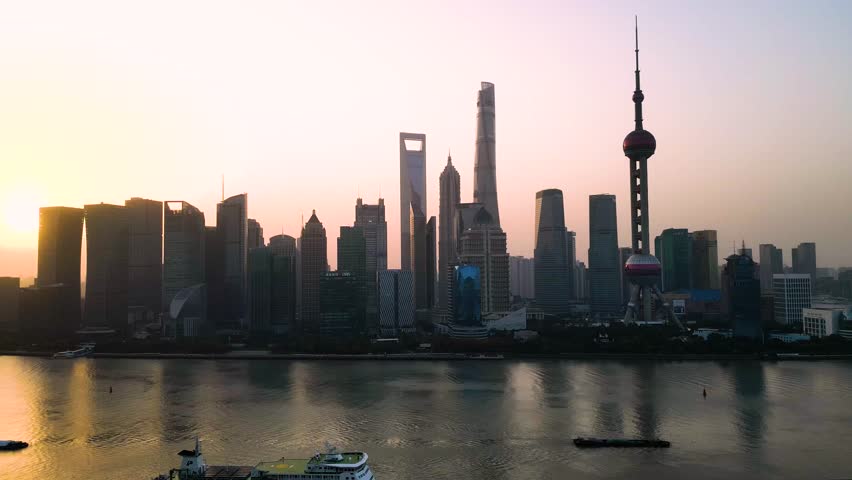 he skyscraper of Oriental Pearl TV Tower in Pudong landmarks is a district of Shanghai, China, located east of the Huangpu River across from the historic city.