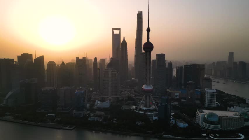 he skyscraper of Oriental Pearl TV Tower in Pudong landmarks is a district of Shanghai, China, located east of the Huangpu River across from the historic city.