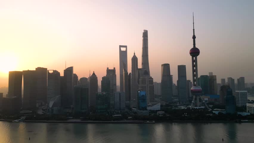 he skyscraper of Oriental Pearl TV Tower in Pudong landmarks is a district of Shanghai, China, located east of the Huangpu River across from the historic city.