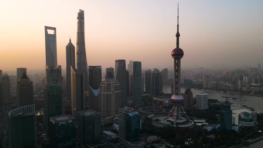 The skyscraper of Oriental Pearl TV Tower in Pudong landmarks is a district of Shanghai, China, located east of the Huangpu River across from the historic city.