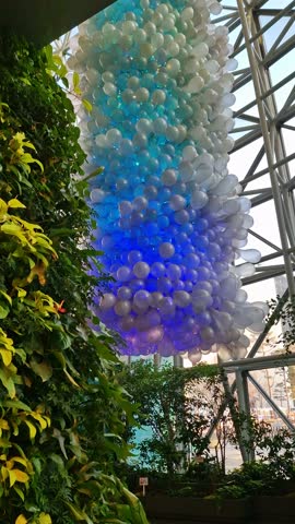 Seoul South Korea City Hall Interior, Plants on Green Wall and Balloon Installation, Vertical View