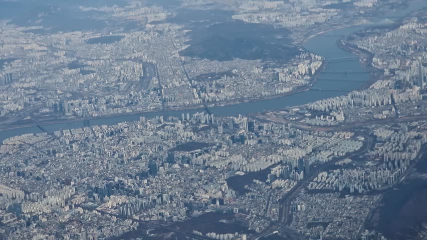 Flying Above Soul, South Korea. Airplane Passenger Point of View Through Window