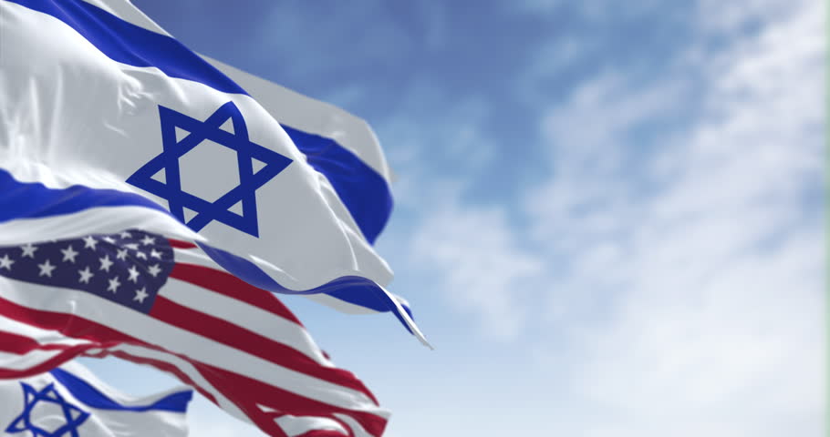 Israel and United States flags waving together. Concept of alliance, diplomacy and international relations. Seamless 3d render animation. Slow motion loop. Selective focus