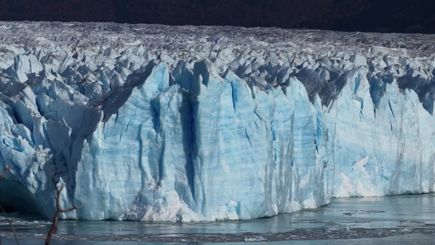 Perito Moreno glacier in Patagonia, Argentina, global warming concept, close up shot of glacier ice, iconic natural travel destination in South America