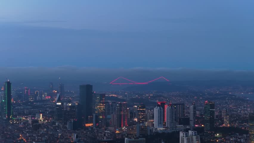Majestic aerial view of Istanbul at dusk, illuminated financial district skyscrapers and modern skyline glowing against twilight over the sprawling Turkish metropolis