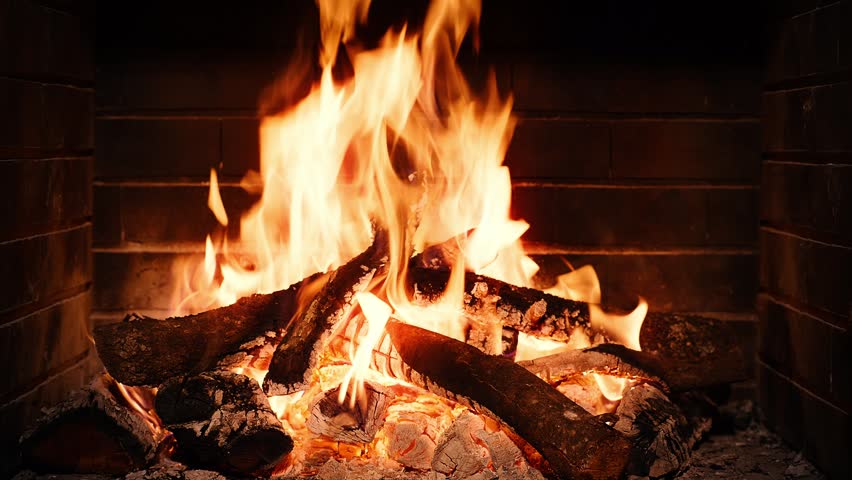 Video of lit fireplace at night