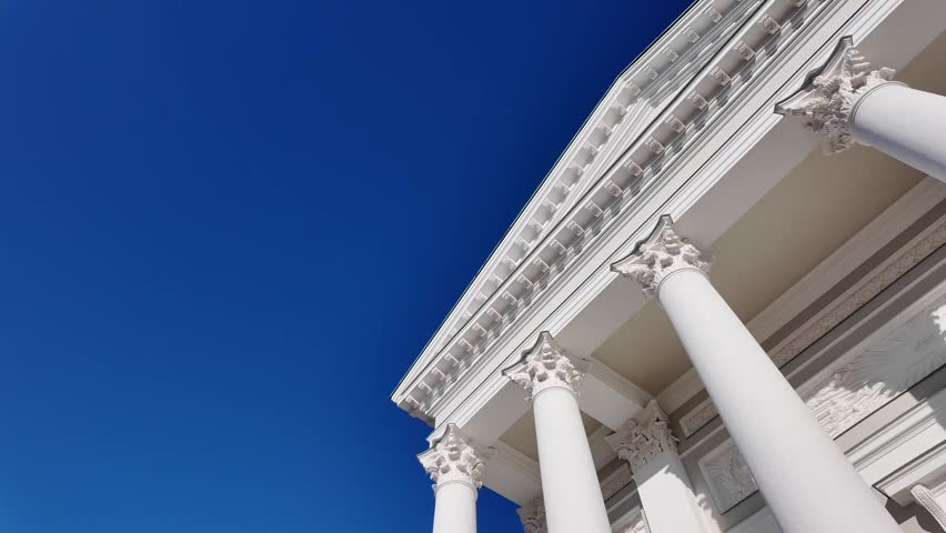 Helsinki Cathedral in Senate Square, Helsinki, Finland. Iconic white Lutheran church with neoclassical architecture under blue sky. Famous landmark and popular tourist destination in Nordic Europe. Nordics slow life
