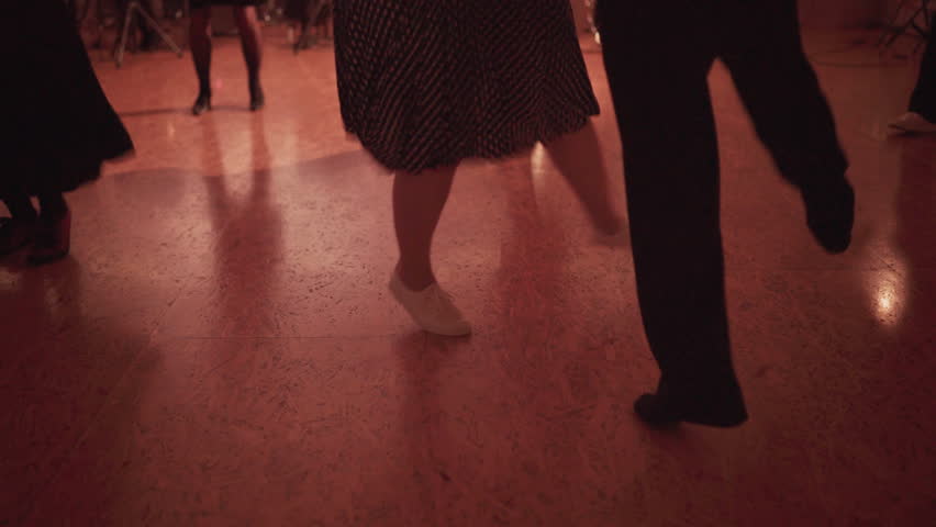 Couple legs video Expression dancing swing dance in ball hall. Women dressed sexy dresses, stockings, high heels shoes. Retro style funny time spending 4K footage.