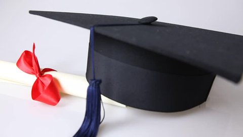 graduate cap and certificate