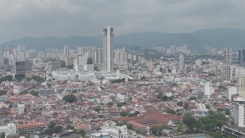 Aerial daytime view of George Town UNESCO heritage zone and Komtar tower in Penang, Malaysia