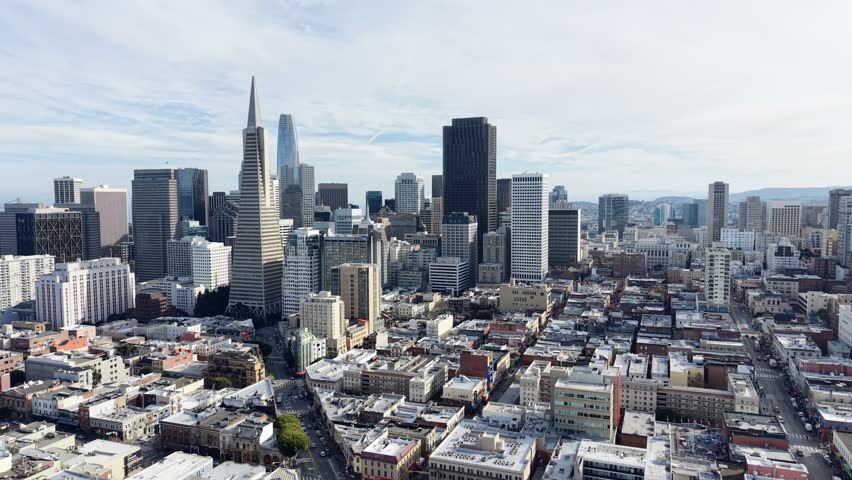 Drone aerial view of San Francisco skyline with Transamerica Pyramid, downtown cityscape and Bay Bridge, California. g.