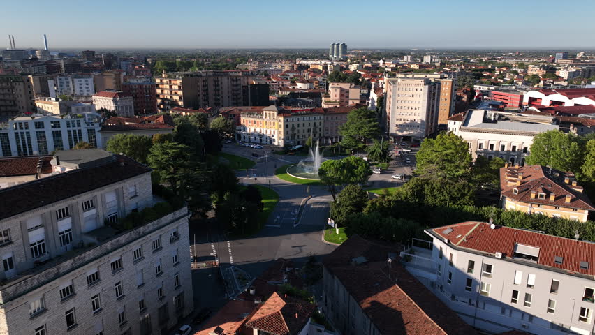 Aerial view of Brescia Italy - old world architecture mixed with modern city living on a summer day