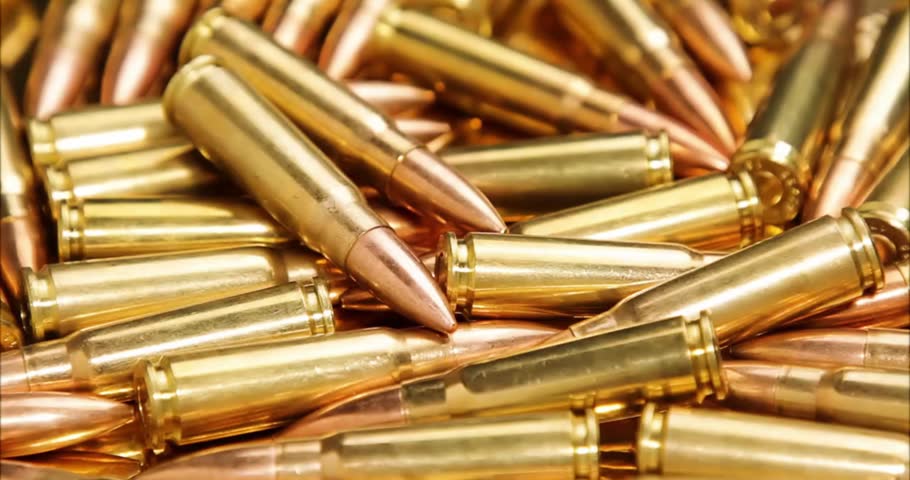 Bullet Pile Closeup Bullets Shells Drop Military concept military defense police or hunting ammo. Close up shell Gun ammunition