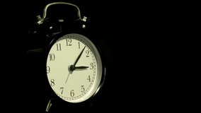 Tme lapse video of a clock time passing over a day to night on black background. - Powered by Shutterstock - Get 15% off with code: PIKWIZARD15