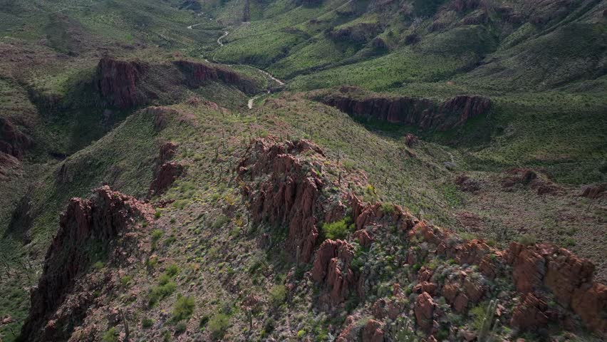 Aerial view of rugged desert terrain with sparse vegetation, showcasing the arid beauty of the landscape, Morristown, Arizona, United States.