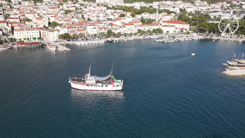 Makarska, Croatia. Coastal town, sea and mountains, Aerial photography from a drone. Croatian town on the Adriatic Sea. Makarska Riviera