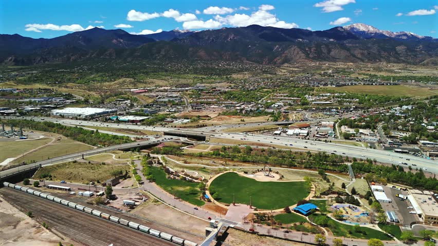 Drone aerial view museum rail corridor park highway Colorado Springs mountains