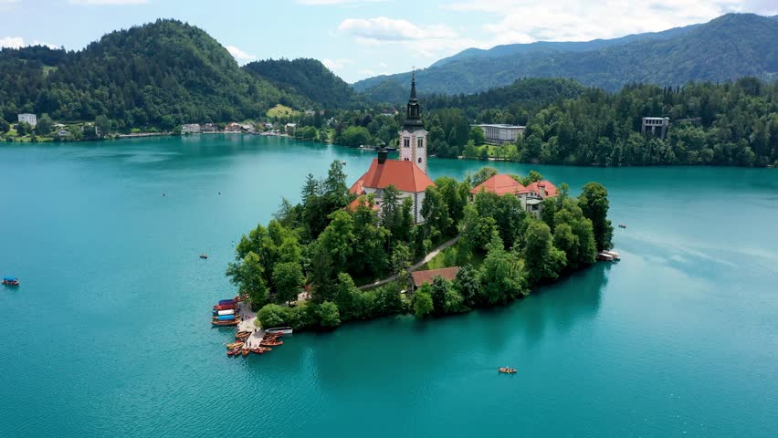Lake Bled in Slovenia. Beautiful mountains and Bled lake with small Pilgrimage Church. Bled lake and island with Pilgrimage Church of the Assumption of Maria. Bled, Slovenia, Europe.