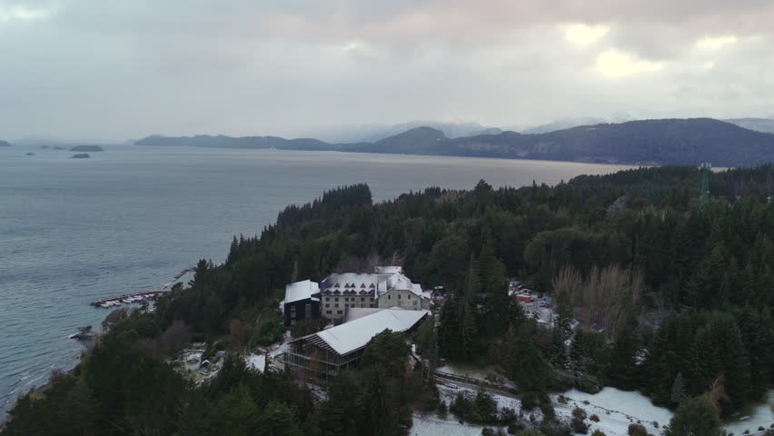 Hotel in San Carlos de Bariloche Río Negro Argentina on Llao Llao Peninsula between Nahuel Huapi Lake and Moreno Lake surrounded by Andean Patagonian forest beneath Andes mountains aerial