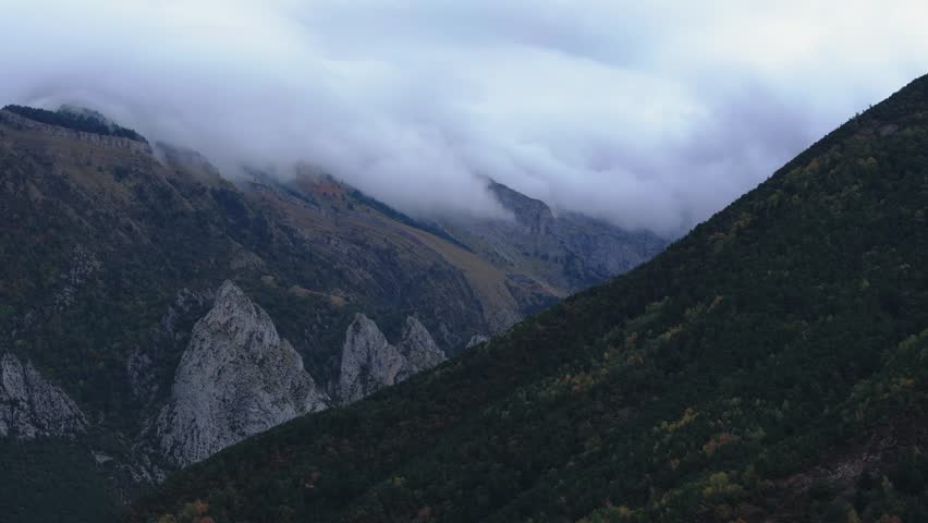 Mountain range in Asturias Spain with dramatic clouds aerial