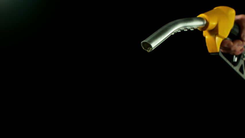 Close-up of Gasoline Spurting from the Gas Pump Nozzle , Slow Motion , Filmed on High Speed Cinematic Camera at 1000 FPS