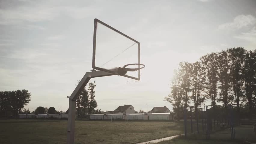 Basketball, hoop and net at outdoor court or park. basketball hoop in the public stadium. urban sports basketball backboard and hoop at outdoor park.