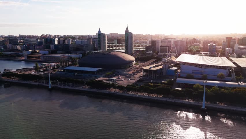 Aerial view of Altice Arena and Vasco da Gama Tower in Parque das Nacoes on a cloudy day. Lisbon, Portugal
