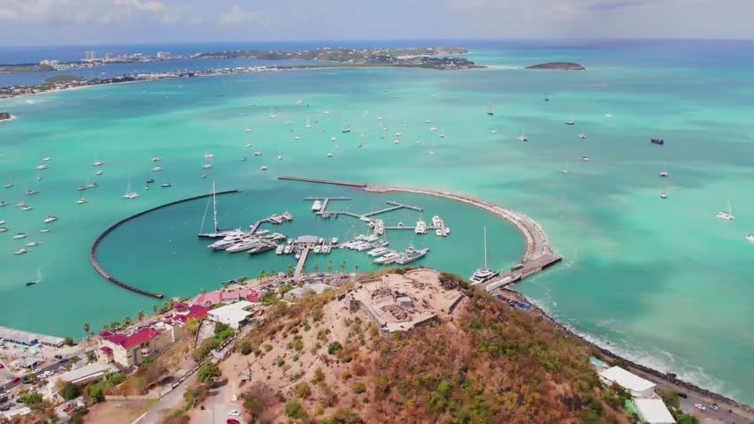 Slow-motion drone glide over the sandy shores of St. Martin.