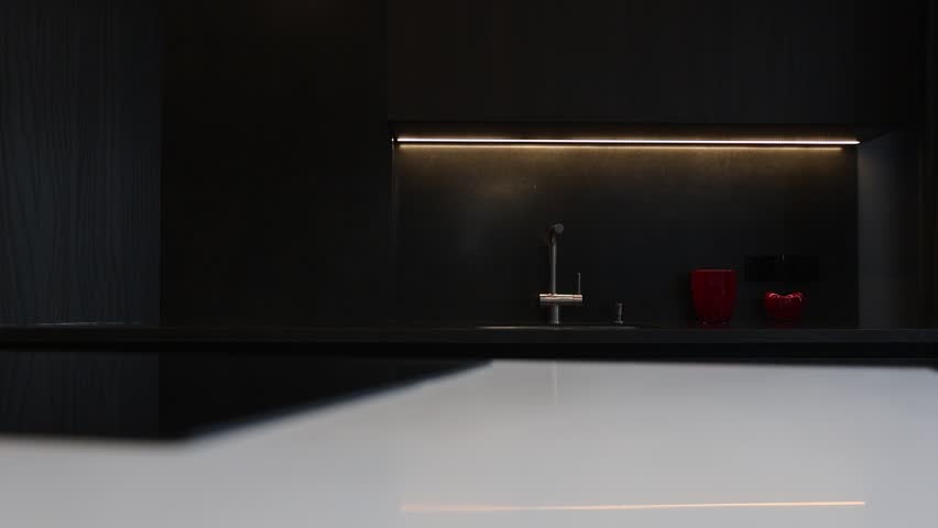 Modern kitchen with contrasting black and white elements