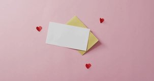Envelopes and red hearts on pink background at valentine's day. valentine's day, love and celebration concept. - Powered by Shutterstock - Get 15% off with code: PIKWIZARD15