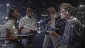 Seated woman presenting notes sparking growing network overlay team on tablet showing business data. Collaboration, analytics, charts, dashboards, visualization, office, professionals - Powered by Shutterstock - Get 15% off with code: PIKWIZARD15