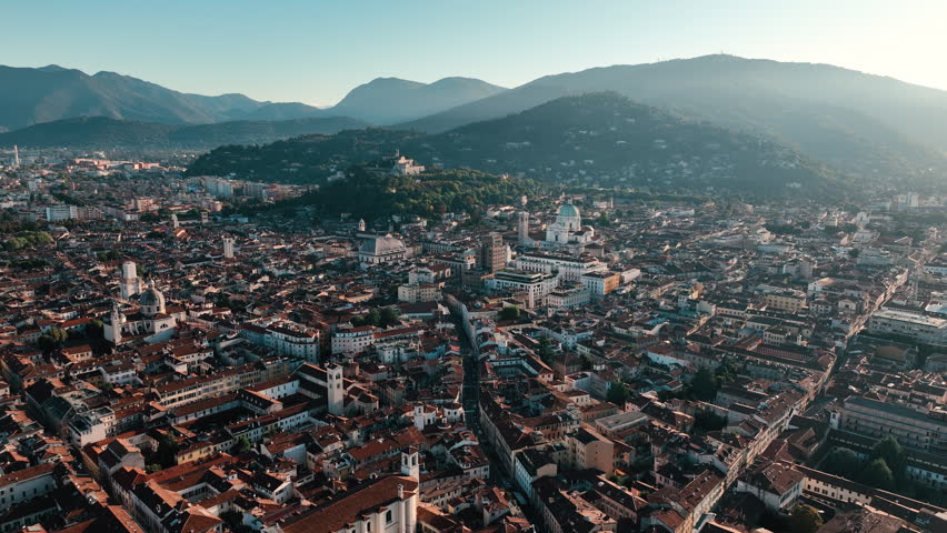 Aerial view of Brescia Italy - old world architecture mixed with modern city living on a summer day