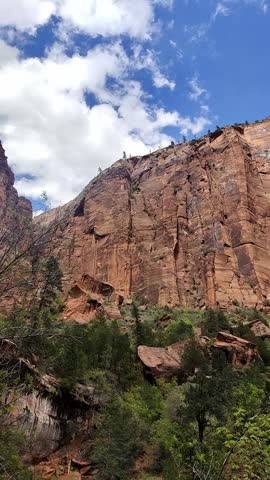 Scenic panoramic view of the Grand Canyon West Rim in Arizona, USA. Desert landscape with layered red rock cliffs, deep canyon formations, Colorado River view. A road trip near Eagle and Guano Point