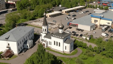 Drone Orbiting above Church Urban Area