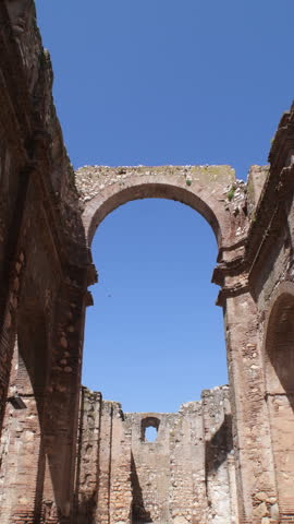 Inside of ruins of the old church in Zafarraya, Spain. 4K Vertical