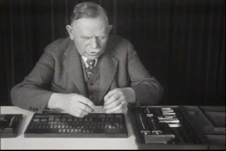 1930s - Workers build Ford Lincoln cars in the factory in the 1930s.
