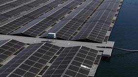 Floating solar panels producing renewable energy on water - Powered by Shutterstock - Get 15% off with code: PIKWIZARD15