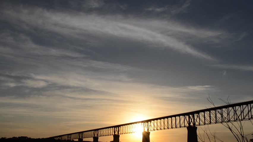 Old railway bridge at sunset on the South Saskatchewan river