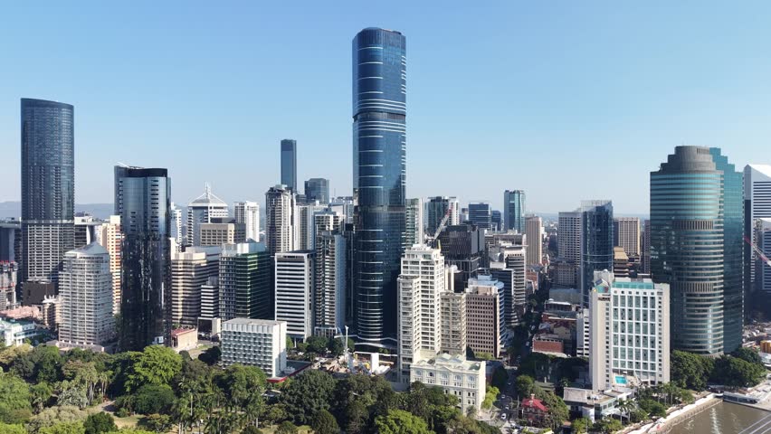 Aerial View of Brisbane City Skyline with Skyscraper Buildings, Riverfront, and Kurilpa Bridge