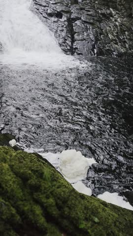 Beautiful waterfalls in Wales forest, lush green nature landscape