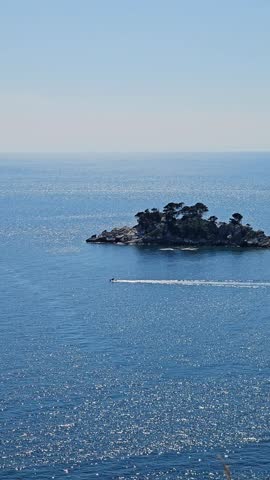 Panoramic View from Mountain Overlooking Sea with Islands, Cliffs and Boats
