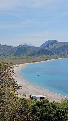 Panoramic View of the Sea from Mountain with Mountain Range in Background