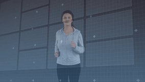 Female presenter bringing hands to circular HUD, rotating rings on transparent charts for tech demo. Holographic, augmented, reality, visualization, interface, analytics, demonstration - Powered by Shutterstock - Get 15% off with code: PIKWIZARD15