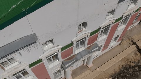 Drone Rapid Downward Motion near Building Facade
